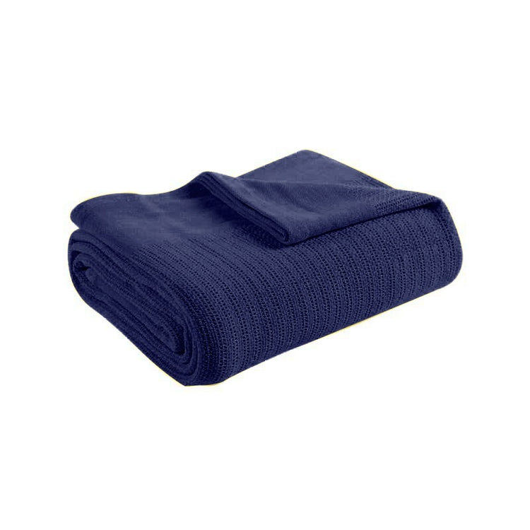 Folded navy blue ribbed cotton thermal blanket.