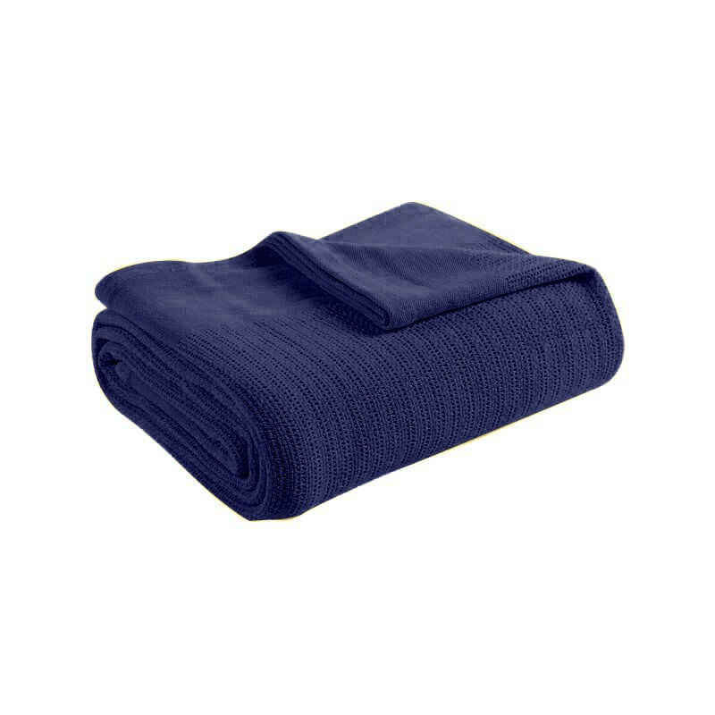 Folded navy blue ribbed cotton thermal blanket.