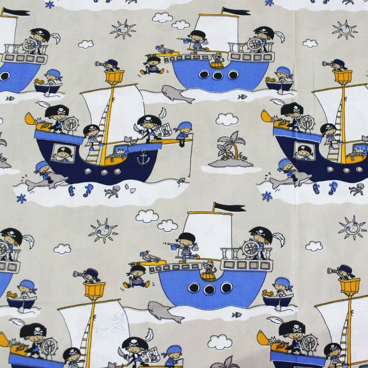 Grey fabric printed with blue cartoon pirate ships, clouds and anchors.
