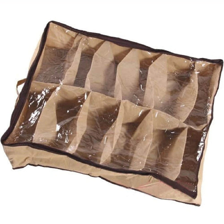 Empty beige shoe organizer showing divided compartments beneath a clear cover.